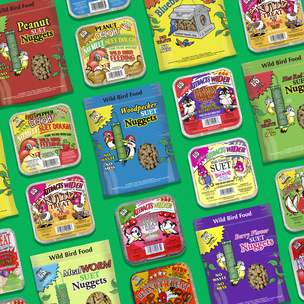Image of several types of suet in colorful packaging laying flat