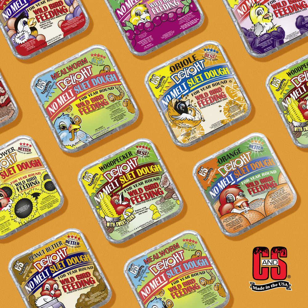Image of no melt suet dough in several different flavors displayed on an orange background